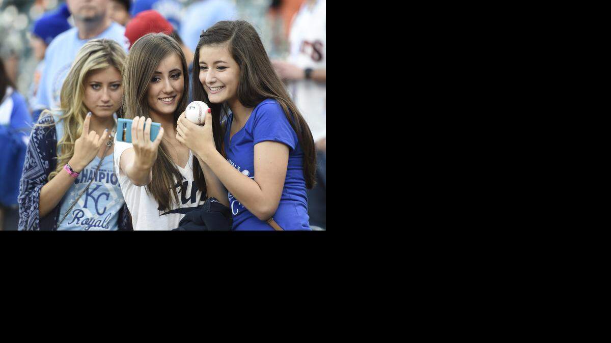 
Kansas City Royals pitcher Jeremy Guthrie nieces, Kailee Guthrie, (left) Shelby Guthrie, (center) and Sadie Guthrie wanted their picture taken with the baseball they caught that was thrown by Kansas City Royals first baseman Eric Hosmer during batting practice prior to the start of game four of the World Series on Saturday, October 25, 2014 at AT&T Park in San Francisco, Calif.
