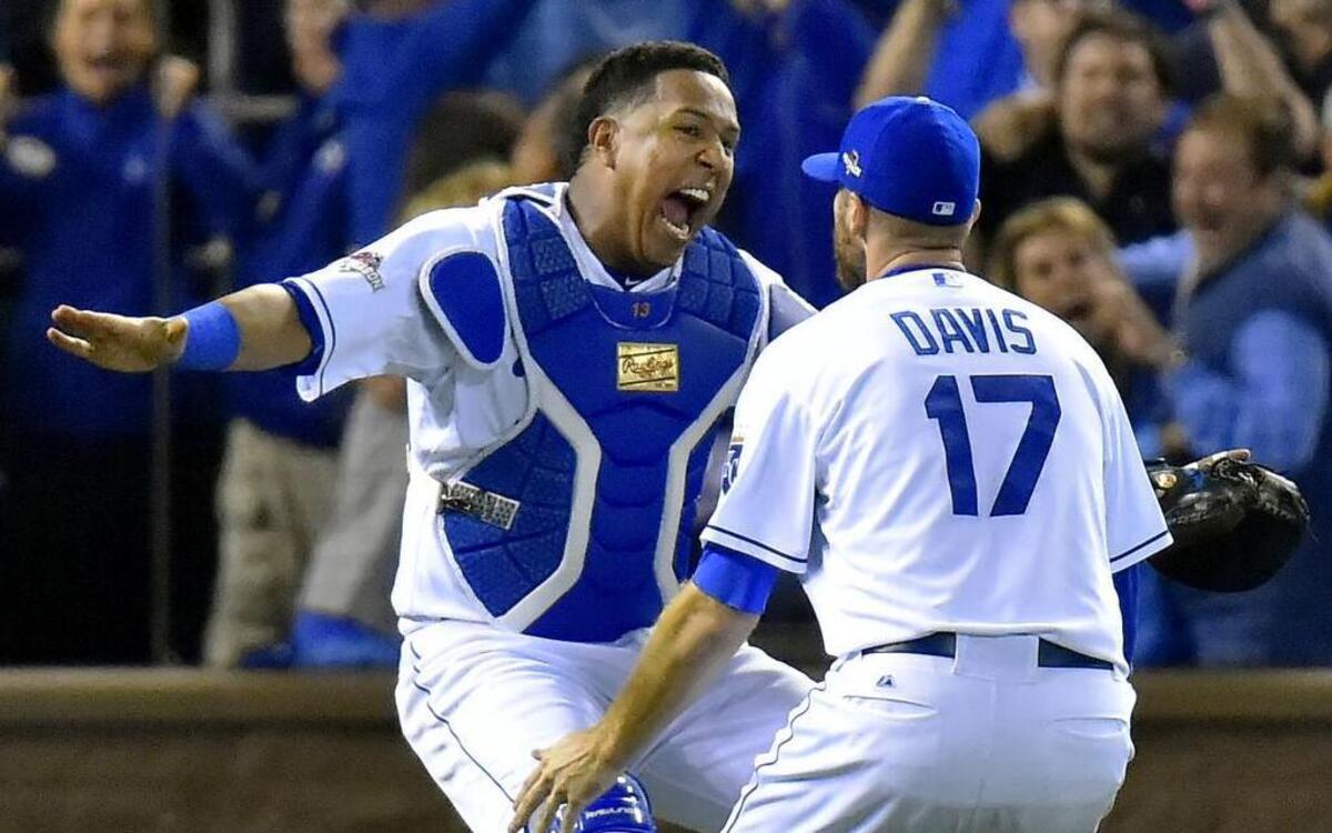 Kansas City Royals catcher Salvador Perez ran to relief pitcher Wade Davis after the Royals defeated Toronto 4-3 to win the ALCS championship Friday, October 23, 2015 at Kauffman Stadium in Kansas City, Mo.