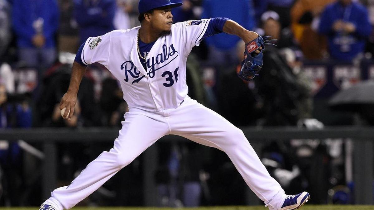 Kansas City Royals starting pitcher Edinson Volquez throws in the first inning during game one of the World Series on Tuesday, October 27, 2015 at Kauffman Stadium in Kansas City, Mo.