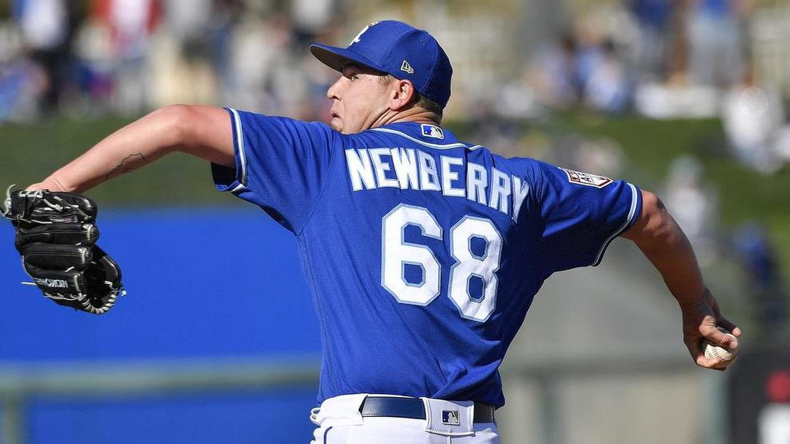 Kansas City Royals relief pitcher Jake Newberry throws in the sixth inning during Saturday’s spring training baseball game against the Texas Rangers on February 23, 2019 at Surprise Stadium in Surprise, AZ.