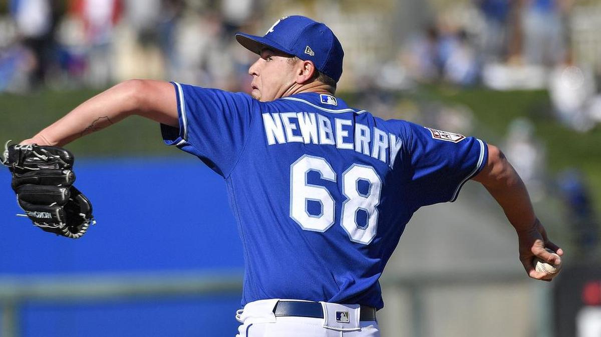 Kansas City Royals relief pitcher Jake Newberry throws in the sixth inning during Saturday’s spring training baseball game against the Texas Rangers on February 23, 2019 at Surprise Stadium in Surprise, AZ.