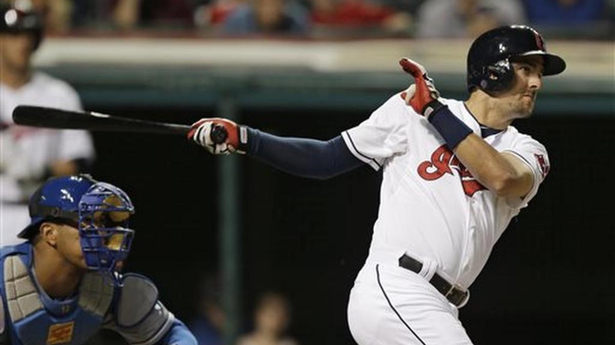 
Cleveland Indians Lonnie Chisenhall hits an RBI-double off Kansas City Royals starting pitcher Edinson Volquez in the third inning of a baseball game, Monday, Sept. 14, 2015, in Cleveland. Francisco Lindor scored on the play. (AP Photo/Tony Dejak)
