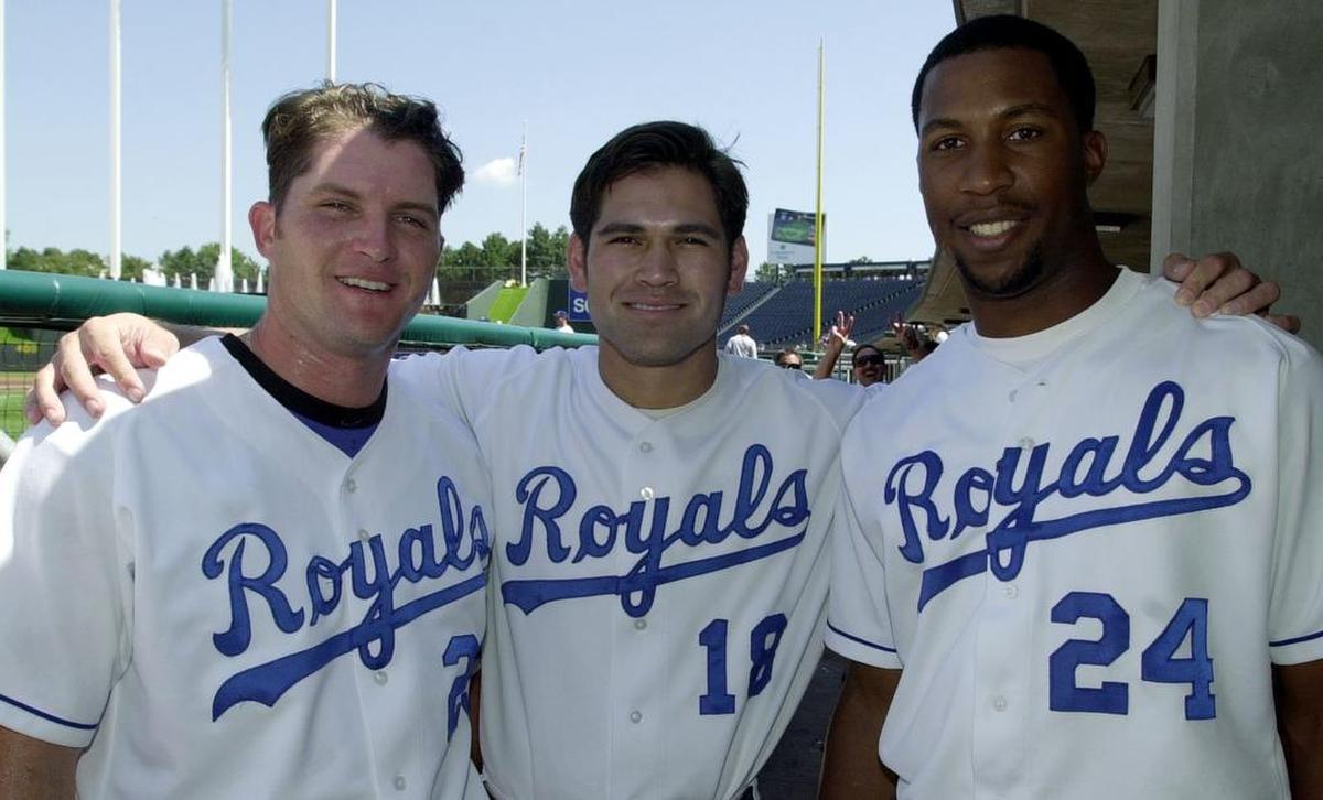 FILE PHOTO: Kansas City Royals players Mike Sweeney, left, Johnny Damon, center, and Jermaine Dye, right, before the start of a game on August 30, 2000, against the Minnesota Twins at Kauffman Stadium.