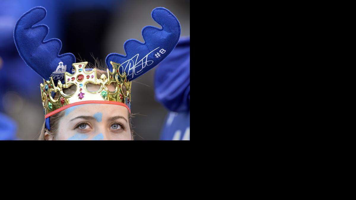
Anna Pankiewicz, Lawrence, Kan. combined her moose antlers and her crown to show her support for the Kansas City Royals and Mike Moustakas before game seven of the World Series on Wednesday, October 29, 2014, at Kauffman Stadium in Kansas City, Mo.
