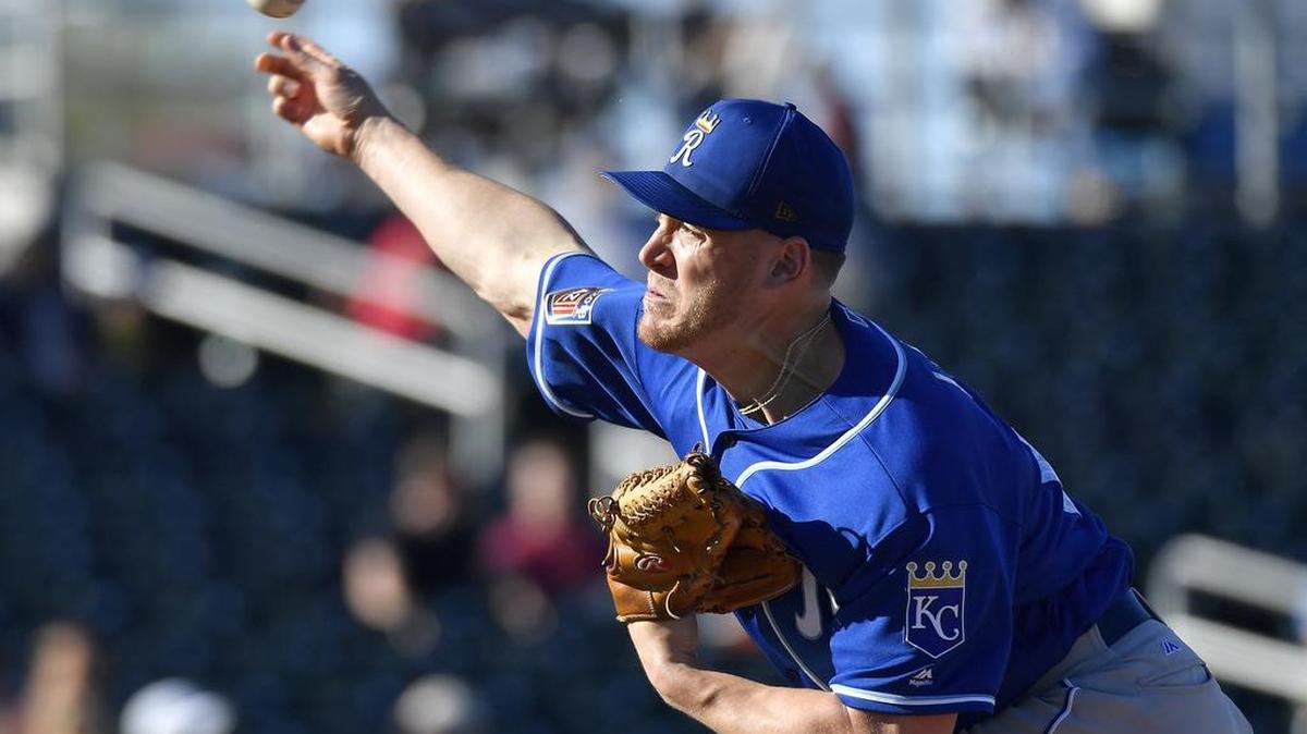 Kansas City Royals relief pitcher Kevin Lenik throws during Sunday's spring training baseball game against the Cincinnati Reds on March 4, 2018 in Goodyear, Arizona.