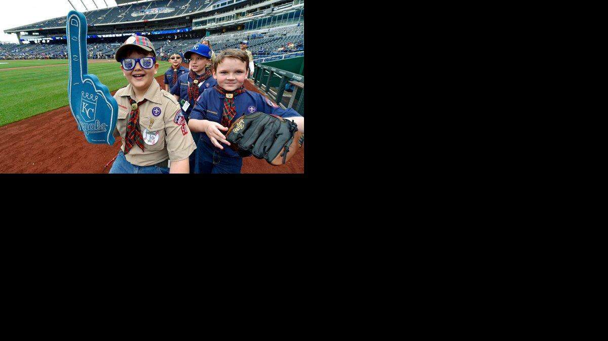 Cub Scouts and Webelos paraded around the diamond on Scout Day at the K before Sunday's Royals-Twins baseball game.
