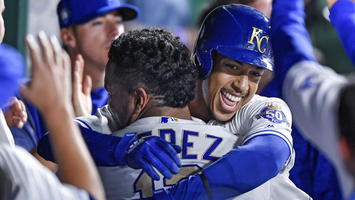 Kansas City Royals’ Adalberto Mondesi gets a hug and a lift from Salvador Perez after Mondesi hit a solo home run in the seventh inning during Friday’s baseball game against the Minnesota Twins on September 14, 2018 at Kauffman Stadium in Kansas City, Mo.