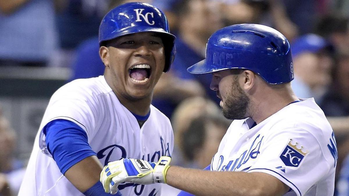 
Royals catcher Salvador Perez (13) congratulated teammate Mike Moustakas after Moustakas hit a two-run home run in the sixth inning against the Detroit Tigers on Tuesday night at Kauffman Stadium.
