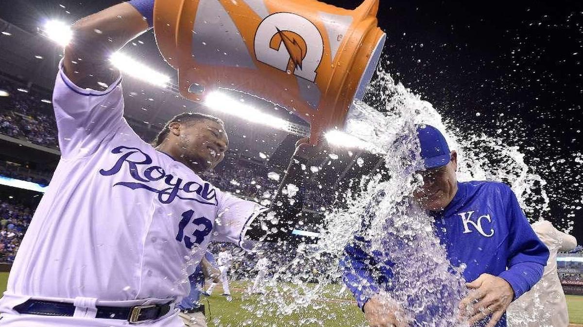 Manager Ned Yost got the victory shower from catcher Salvador Perez after the Royals beat the White Sox 3-2 on Saturday for Yost’s 1,000th career win.