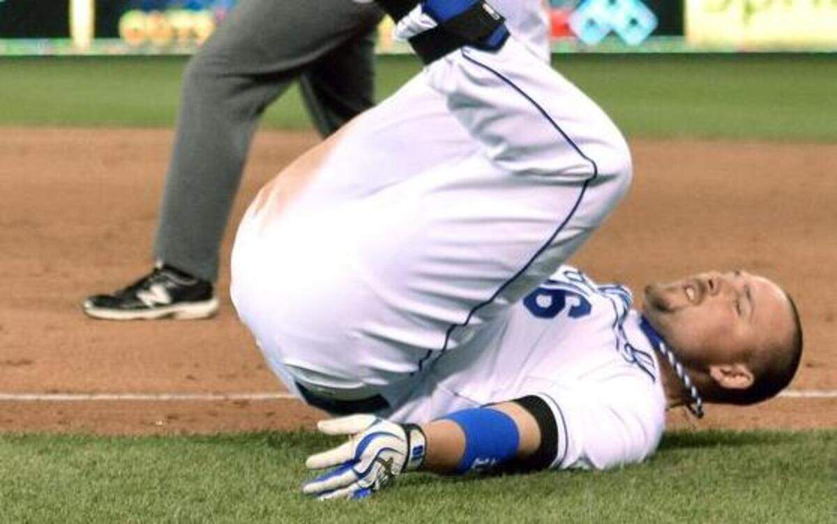 
The Royals’ Billy Butler ended up on his back after he tripped over first base trying to beat out a grounder Monday.
