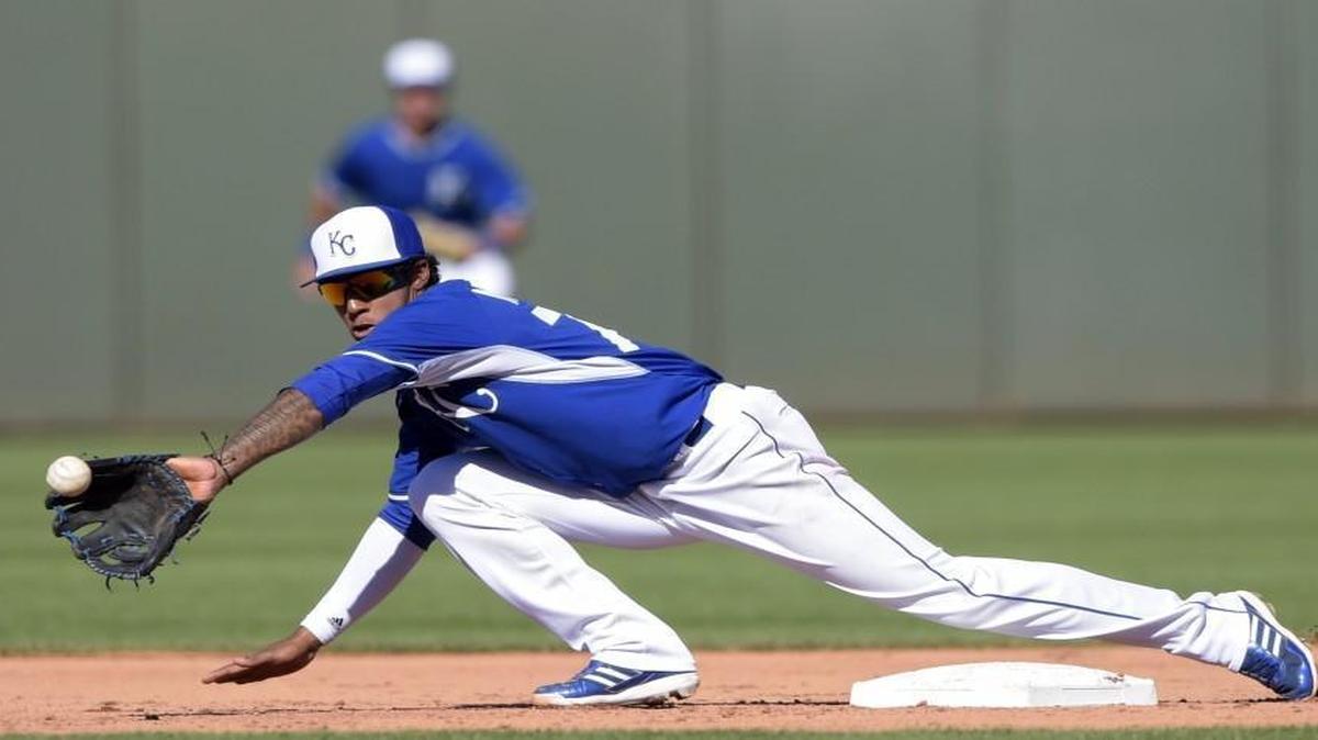 Kansas City Royals shortstop Raul Mondesi was pulled off the bag while catching a pick-off attempt during the Kansas City Royals and the Cleveland Indians spring training baseball game in March.