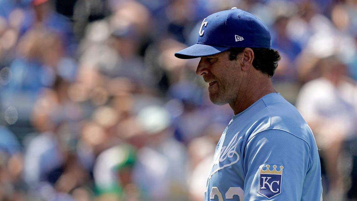 Kansas City Royals manager Mike Matheny walks back to the dugout after making a pitching change during the ninth inning of a baseball game against the Oakland Athletics Sunday, June 26, 2022, in Kansas City, Mo. The Athletics won 5-3.