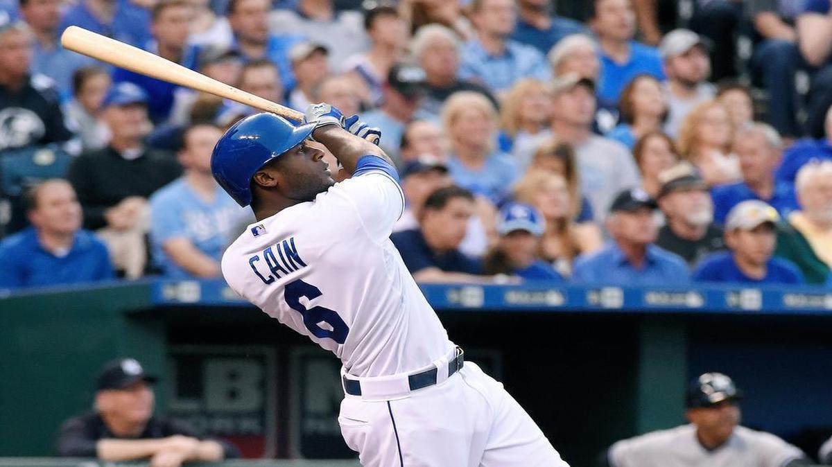 
The Royals' Lorenzo Cain (6) follows through on a sacrifice fly to score Mike Moustakas from third in the third inning during Friday's baseball game against the Yankees at Kauffman Stadium. Cain was three for four at the plate with five RBI.
