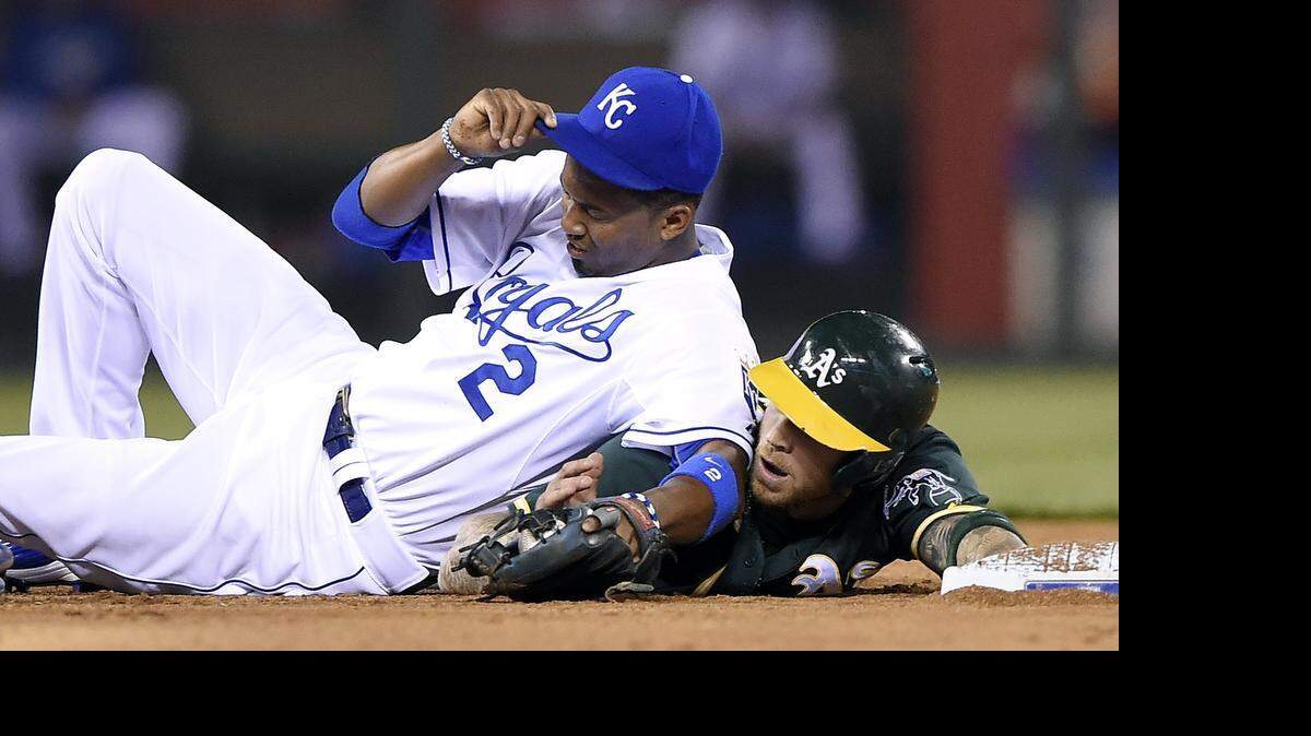 
Royals shortstop Alcides Escobar ended up on top of Oakland Athletics’ Brett Lawrie after forcing him out at second in seventh inning before Escobar exited the game Friday night at Kauffman Stadium.
