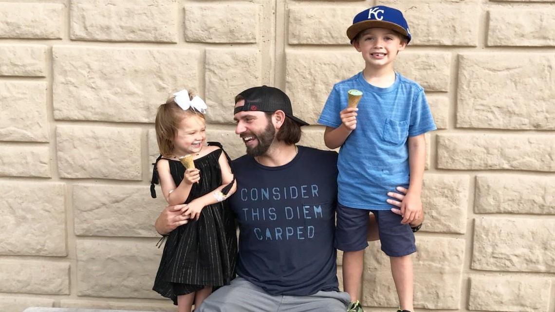 Flanked by his daughter Colby (left) and son Beckett, Royals pitcher Jason Hammel sports a T-shirt with the slogan of “Consider this diem carped” — a nod to his late father’s favorite phrase “carpe diem.”
