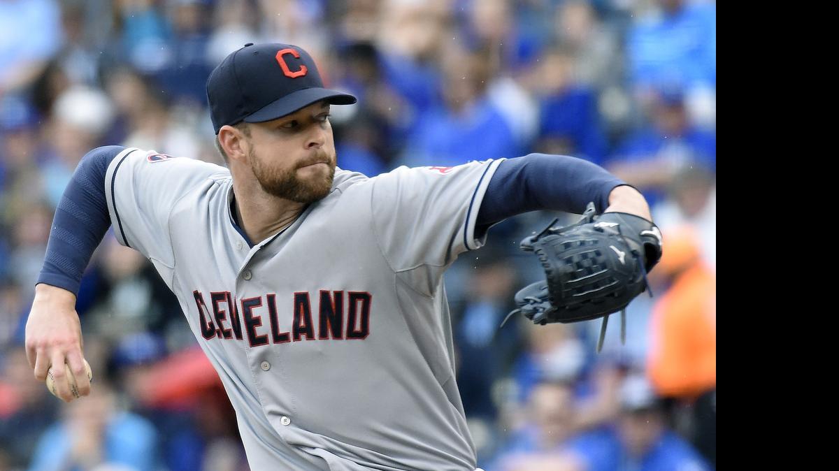 
Cleveland Indians starting pitcher Corey Kluber (28) throws in the first inning during Thursday's baseball game against the Kansas City Royals on May 7, 2015 at Kauffman Stadium in Kansas City, Mo.
