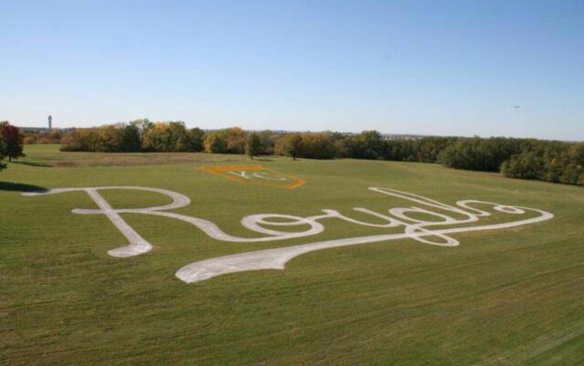 
Doug Cartwright, a field maintenance employee with the Kansas City Aviation Department, drew the Royals design and used GPS to guide him while he mowed the field, which is on the Aviation Department’s property.
