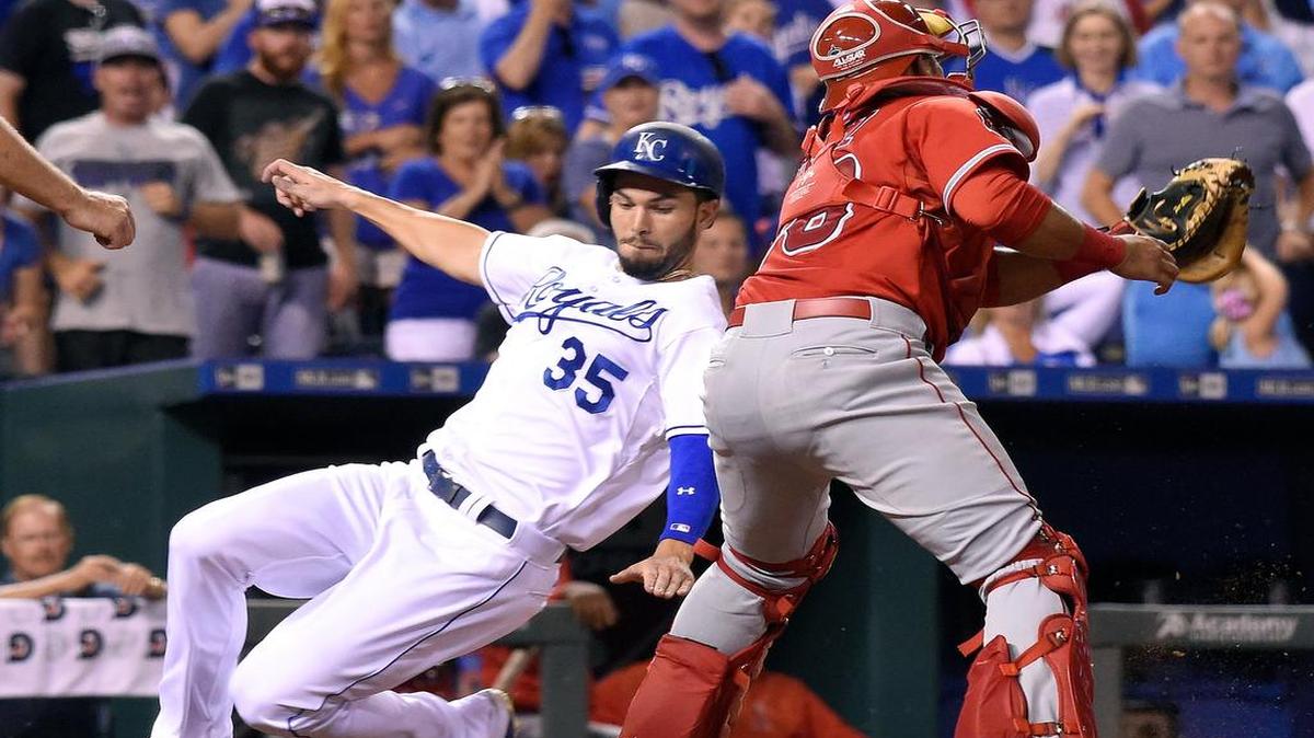 
Eric Hosmer of the Royals scored before the tag from Angels catcher Carlos Perez in the seventh inning on a double by Kendrys Morales on Thursday.

