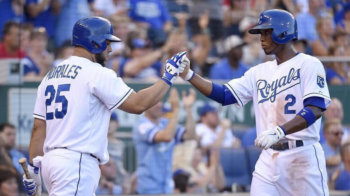 
 Kendrys Morales greeted Alcides Escobar after scoring on a fielders choice by Eric Hosmer in the fourth inning.

