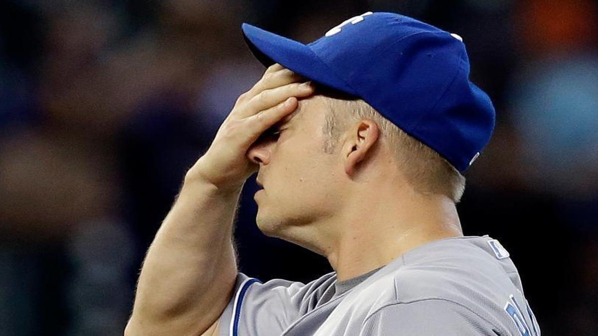 
Royals starting pitcher Joe Blanton wipes his forehead after giving up a solo homer to the Astros' Jose Altuve in the third inning of Monday’s baseball game in Houston. Blanton pitched two and two-thirds innings, giving up five runs and four hits.

