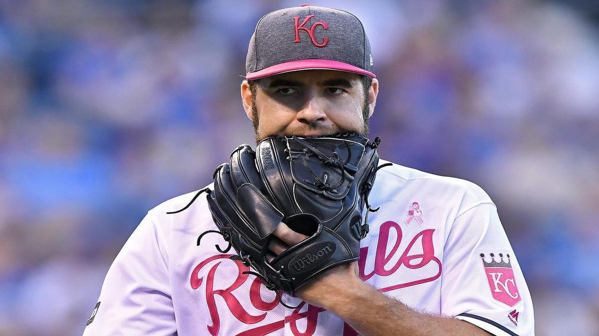 Kansas City Royals starting pitcher Nate Karns chewed on his glove as he walked during a game against the Baltimore Orioles in May at Kauffman Stadium in Kansas City, Mo.