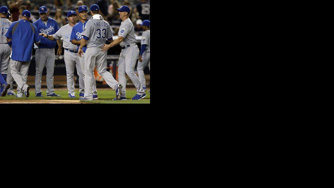 Royals starting pitcher James Shields (33) was congratulated by teammates after they defeated the Yankees 1-0 in Friday's baseball game in New York.
