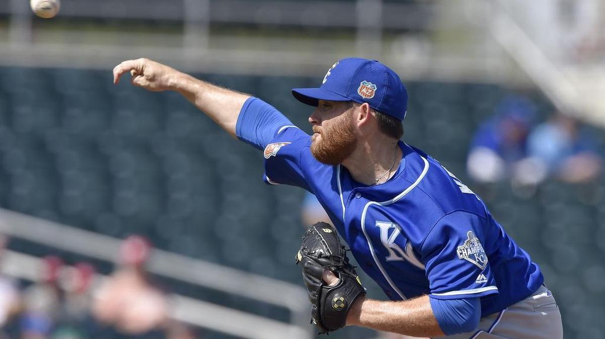 Kansas City Royals starting pitcher Ian Kennedy throws in the first inning during Tuesday's spring training baseball game against the Cincinnati Reds on March 15, 2016 in Goodyear, Ariz.