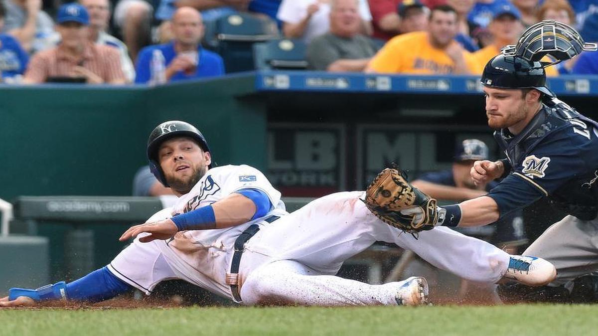 
The Royals' Alex Gordon was tagged out at home by Brewers catcher Jonathan Lucroy on a hit by Salvador Perez to end the third inning during Thursday's baseball game at Kauffman Stadium.
