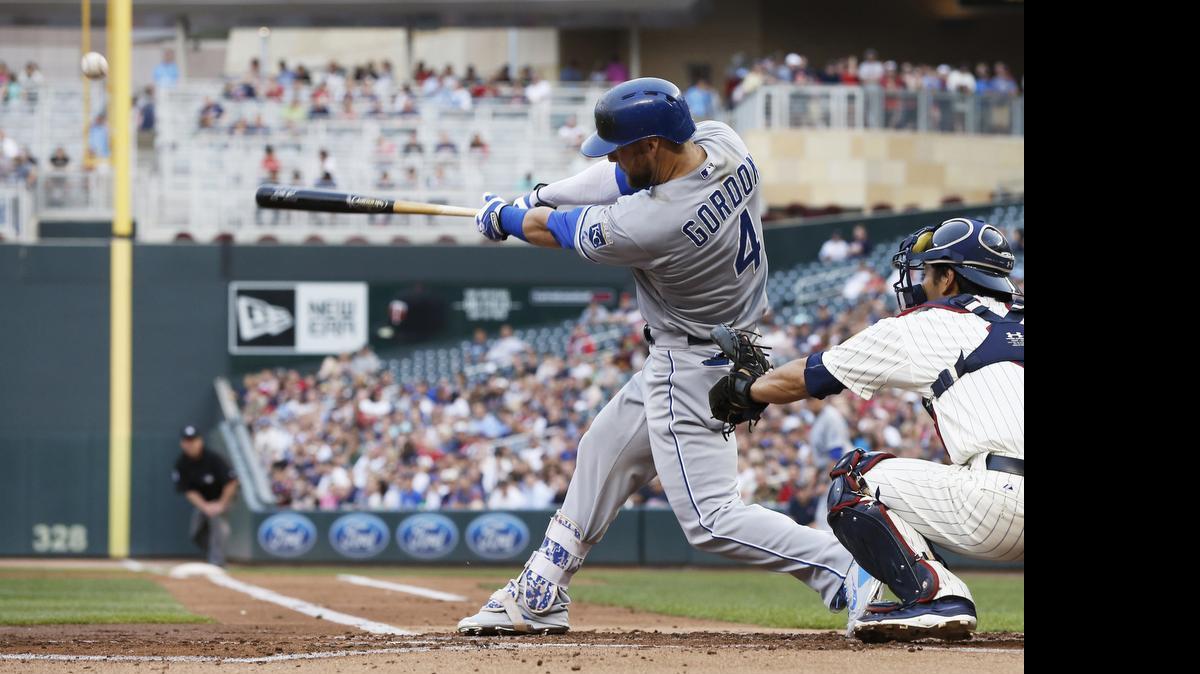 
Kansas City Royals’ Alex Gordon hits a three-run home run off Minnesota Twins pitcher Kyle Gibson during the first inning of a baseball game, Wednesday, June 10, 2015, in Minneapolis. 
