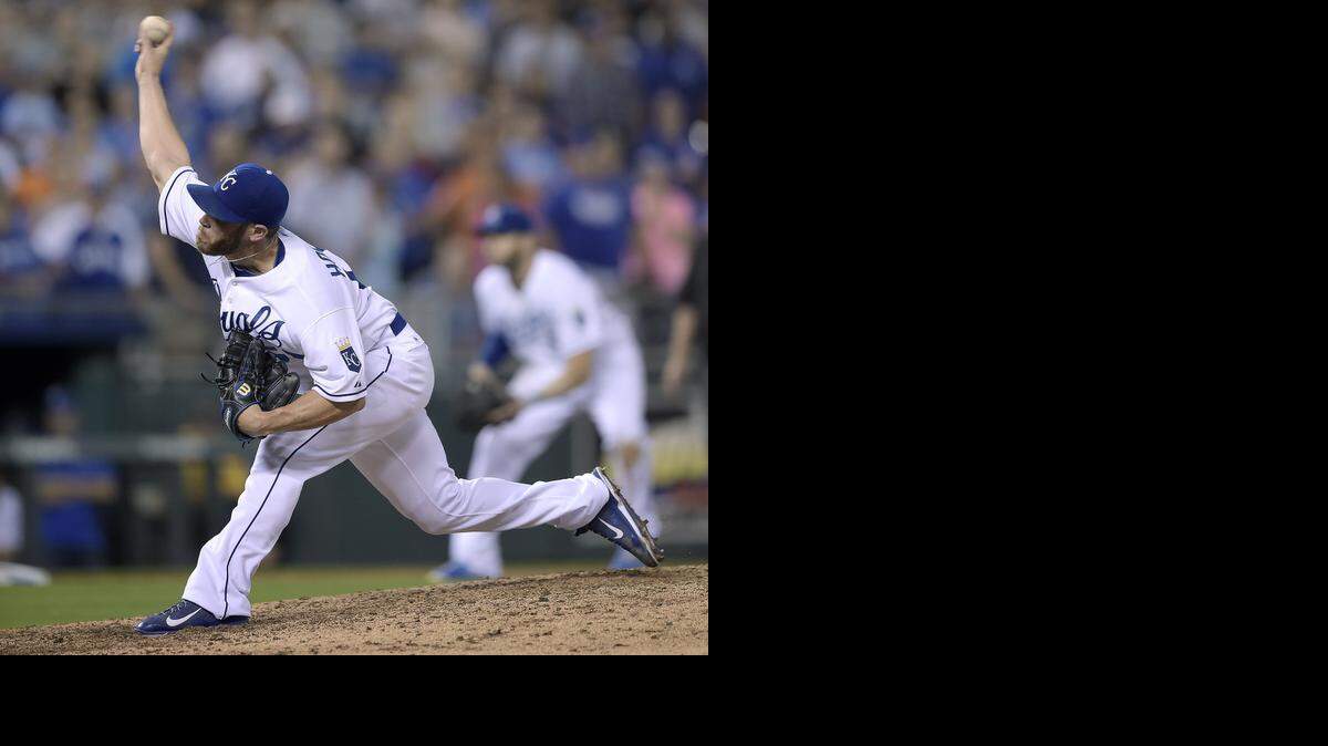 
Kansas City Royals relief pitcher Greg Holland threw the last pitch of the ninth inning Friday, ensuring a 4-2 win over the San Francisco Giants and gaining his 100th career save.
