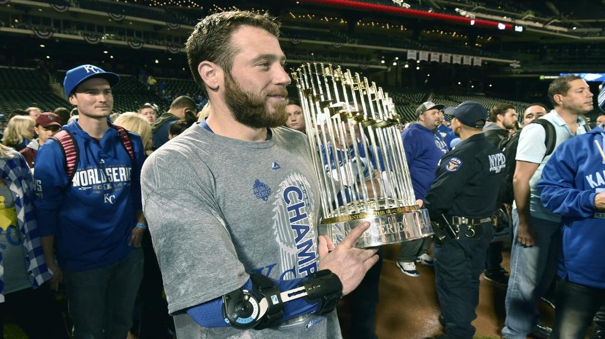 Relief pitcher Greg Holland held the World Series trophy after the Royals beat the New York Mets on November 2, 2015 at Citi Field in New York, NY.