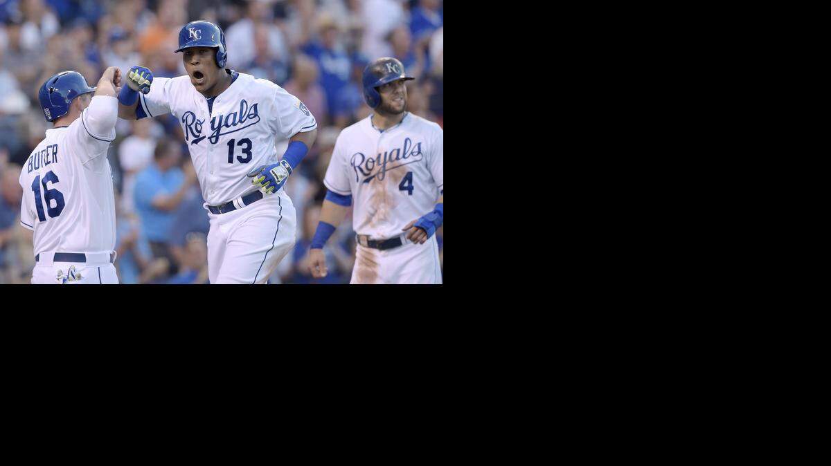 
Kansas City Royals' Salvador Perez (13) celebrates after hitting a three run home run that scored Billy Butler (16) and Alex Gordon (4) in the sixth inning during Saturday's baseball game against the New York Yankees on June 7, 2014 at Kauffman Stadium in Kansas City, Mo.
