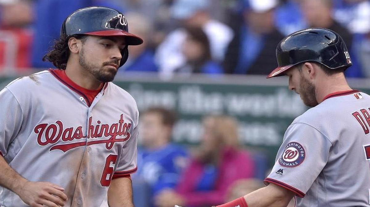 The Nationals’ Stephen Drew (right) greeted teammate Anthony Rendon after Rendon scored on a sacrifice fly by Daniel Murphy in the first inning against the Royals on Monday night at Kauffman Stadium.