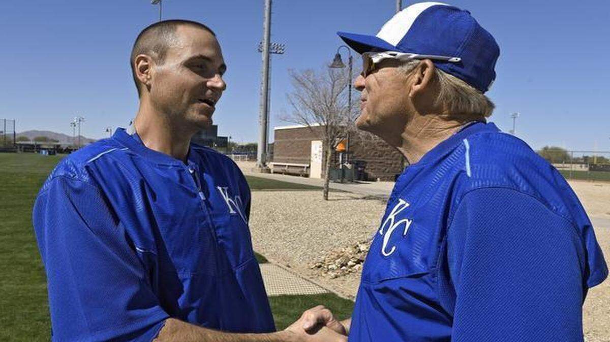 
Kansas City Royals pitcher Chris Young met with first base coach Rusty Kuntz on Saturday.

