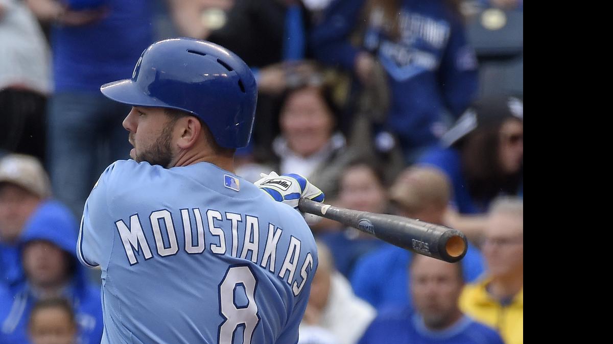 
Kansas City Royals' Mike Moustakas (8) follows through on an RBI single in the first inning that scored Alex Gordon during Thursday's baseball game against the Cleveland Indians on May 7, 2015 at Kauffman Stadium in Kansas City, Mo.
