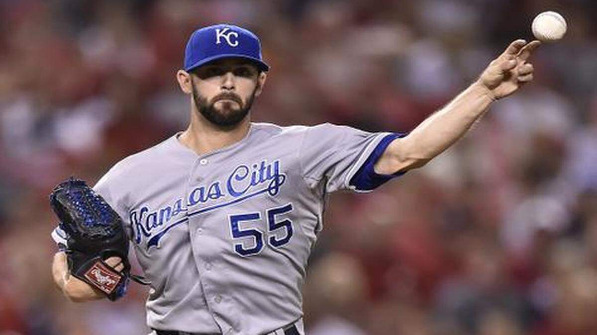 
Kansas City Royals pitcher Tim Collins threw to first base in the ninth inning against the Los Angeles Angels during Thursday's ALDS baseball game on October 2, 2014 at Angels Stadium in Anaheim, Calif.
