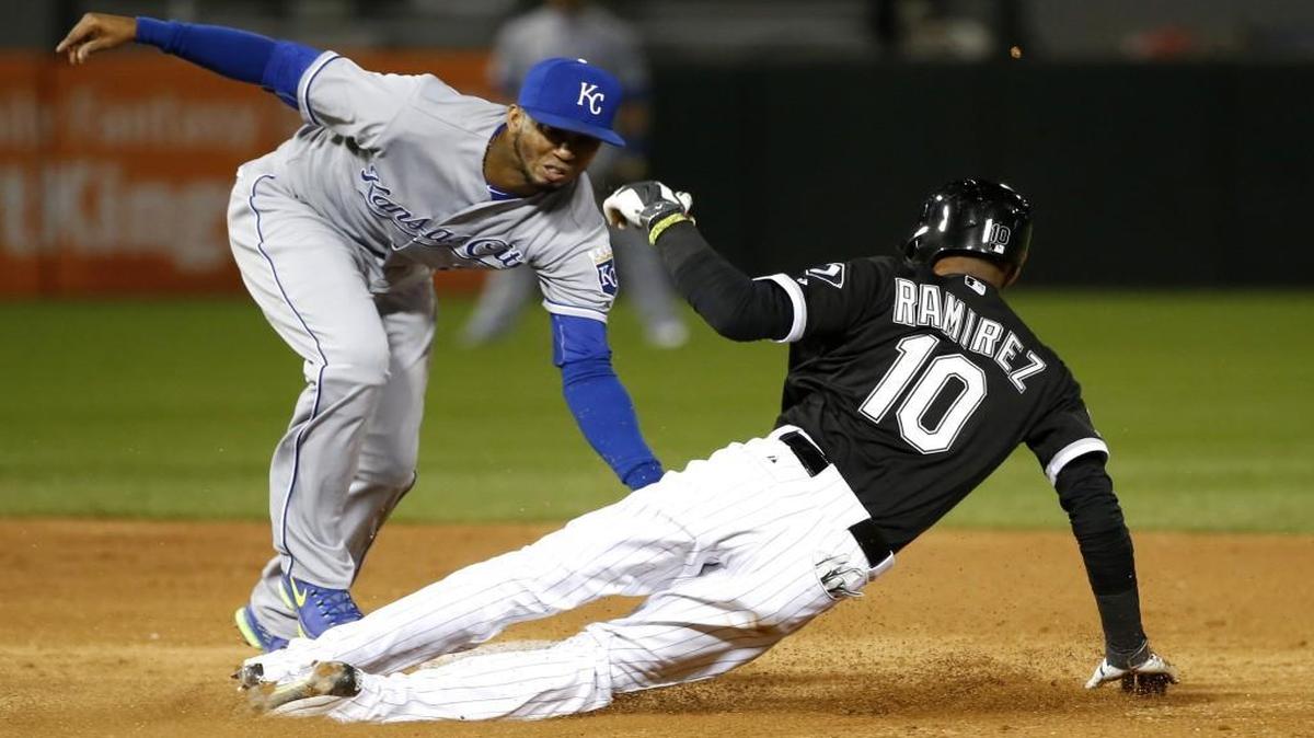 
Royals shortstop Alcides Escobar catches the White Sox's Alexei Ramirez trying to steal second on a throw from catcher Salvador Perez during Thursday’s baseball game in Chicago.
