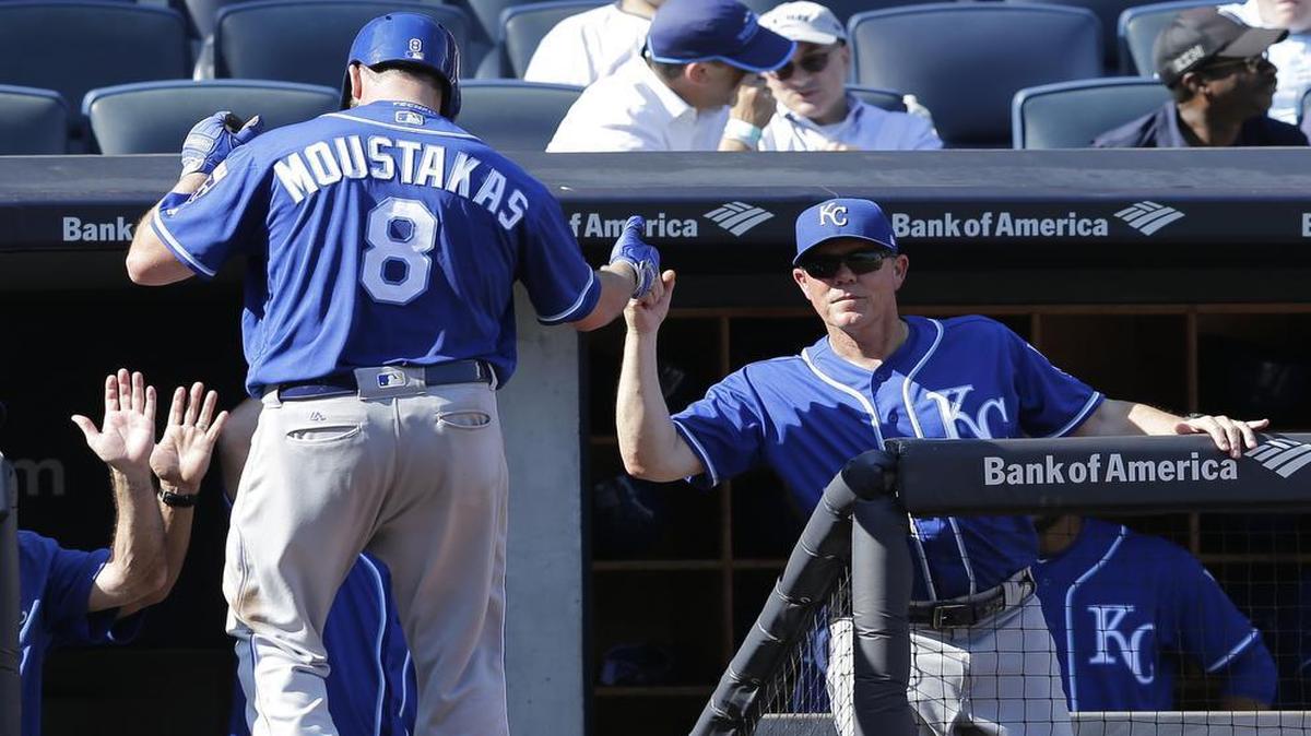Royals manager Ned Yost (right) was there to greet Mike Moustakas after Moustakas hit his 38th homer of the season in the seventh inning of Monday’s game against the Yankees at Yankee Stadium.