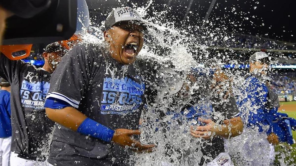 
Royals catcher Salvador Perez (13) and third baseman Mike Moustakas (8) were dunked with ice water after Thursday’s 10-4 victory over the Mariners to clinch the AL Central Division at Kauffman Stadium.

