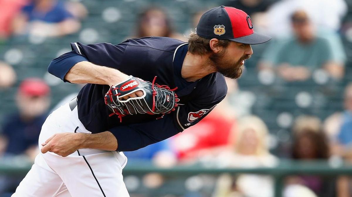 Cleveland Indians relief pitcher Andrew Miller throws a pitch against the Colorado Rockies during the third inning of a spring training baseball game Friday, March 3, 2017, in Goodyear, Ariz. The Rockies defeated the Indians 16-7.