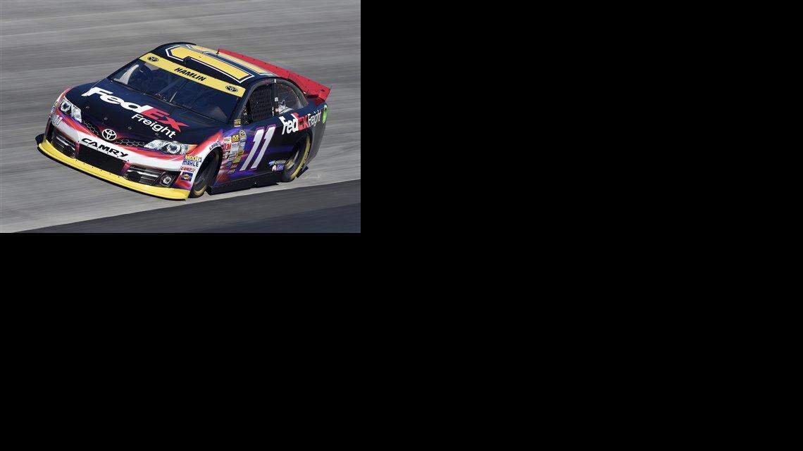 
Denny Hamlin, here practicing for Sunday’s NASCAR Sprint Cup series race at Dover International Speedway, is in danger of being bumped out of the Chase for the Sprint Cup.
