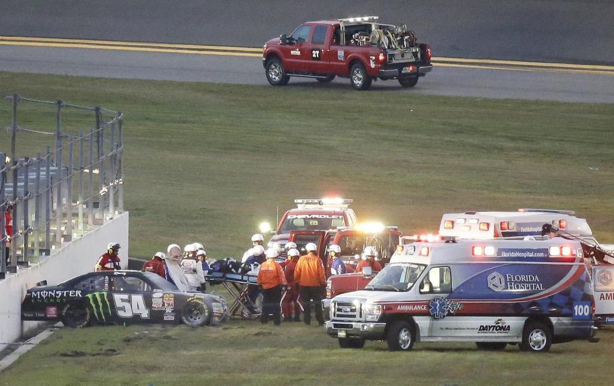 Kyle Busch suffered a compound fracture in his lower right leg and a broken left foot in a crash into an unprotected infield wall during a Florida 300 Xfinity Series race earlier this year at Daytona International Speedway. Busch (center) was taken to an ambulance on a stretcher.