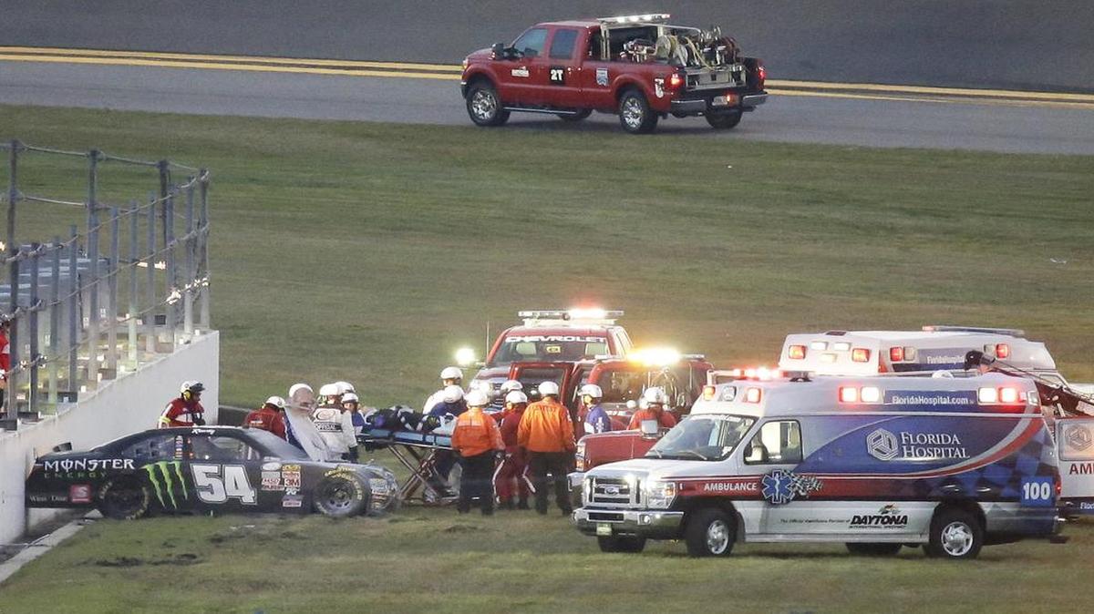 
Kyle Busch suffered a compound fracture in his lower right leg and a broken left foot in a crash into an unprotected infield wall during a Florida 300 Xfinity Series race earlier this year at Daytona International Speedway. Busch (center) was taken to an ambulance on a stretcher.


















