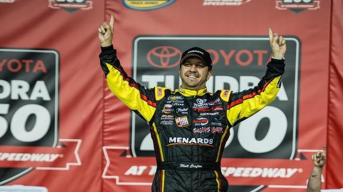 
Camping World Truck Series driver Matt Crafton (88) celebrated after winning Friday's 15th Annual Toyota Tundra 250 at Kansas Speedway.

