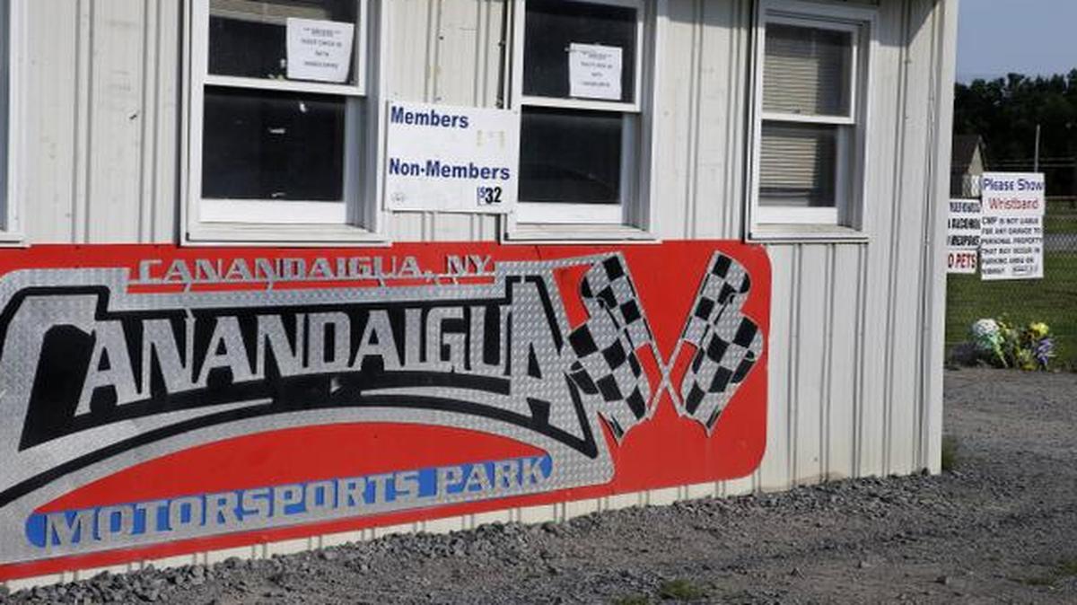
Flowers, far right, are seen at Canandaigua Motorsports Park Monday, Aug. 11, 2014, in Canandaigua, N.Y. 
