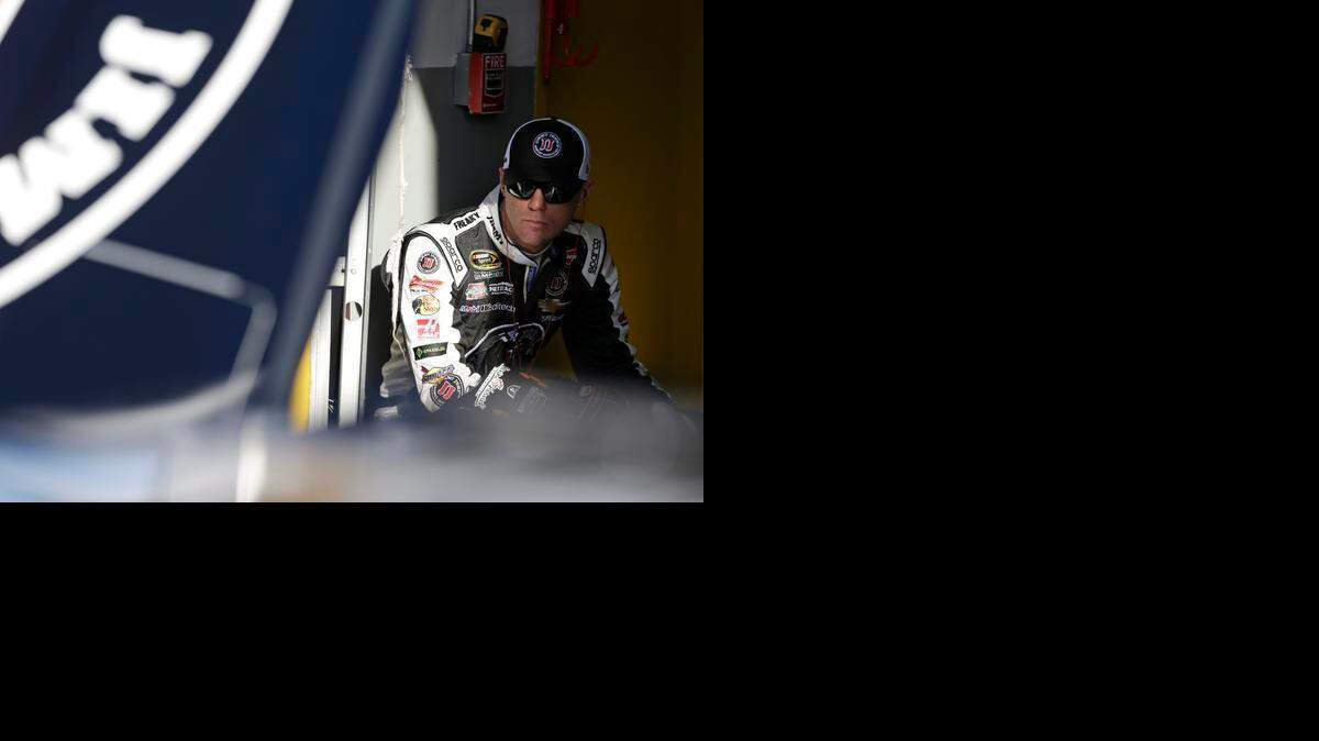 
Driver Kevin Harvick waited in his garage before a practice last week at Daytona International Speedway. Harvick, the Sprint Cup defending champion, will start in the No. 11 position in Sunday’s Daytona 500.
