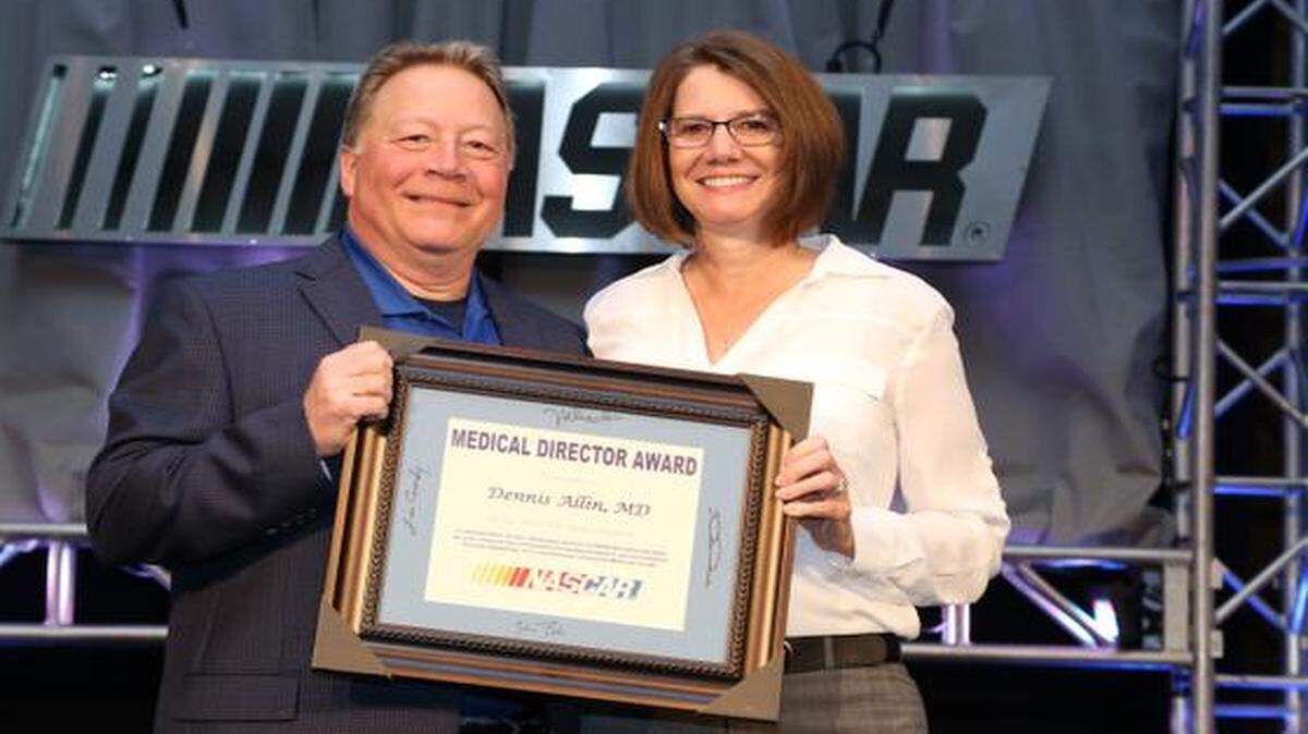 
Dr. Dennis Allin with Lori Sheppard, Director, NASCAR Medical Liaisons
