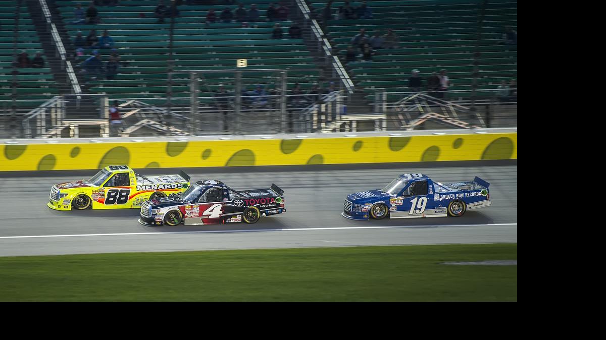 
Tyler Reddick (right) pursued Matt Crafton (left) and Erik Jones before finishing 13th in Friday night’s Camping World Truck Toyota Tundra 250. Reddick likes driving for owner Brad Keselowski because Keselowski is involved with the team.

