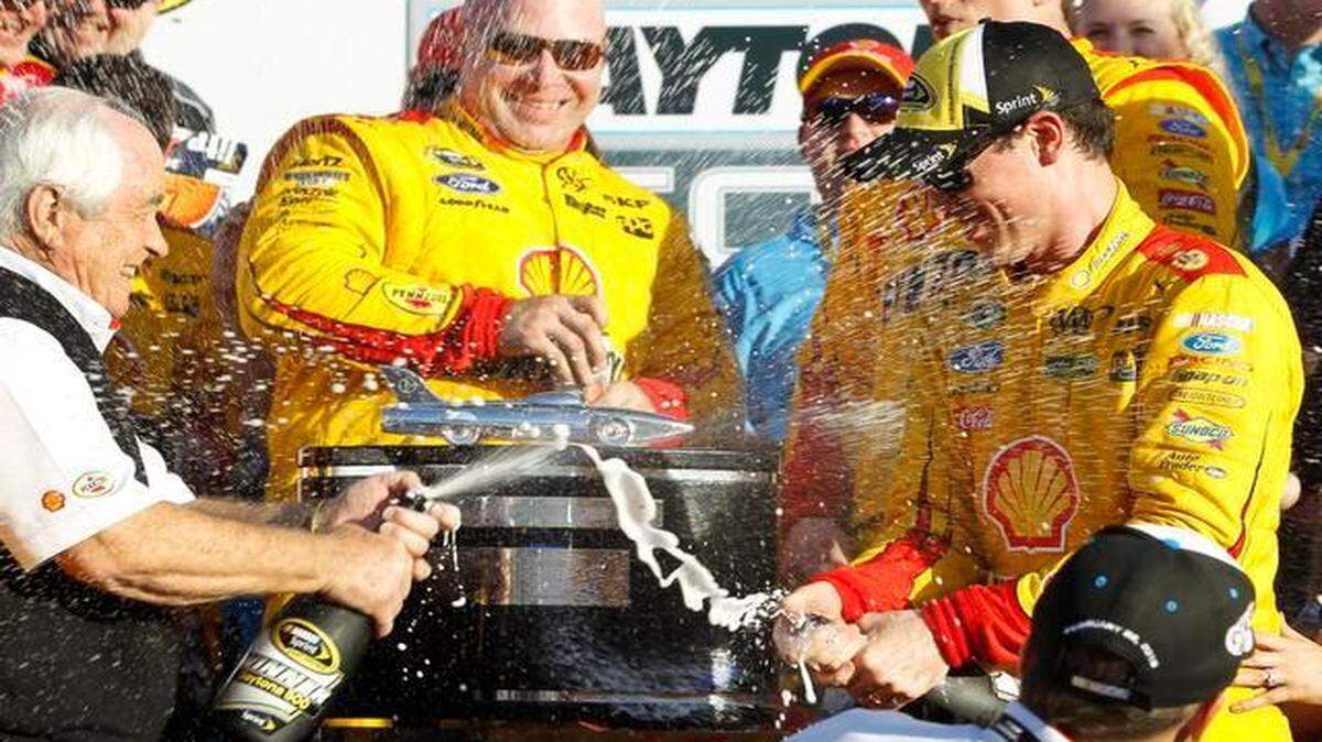
Joey Logano (right) celebrated with team owner Roger Penske after winning the Daytona 500 on Sunday in Daytona Beach, Fla.

