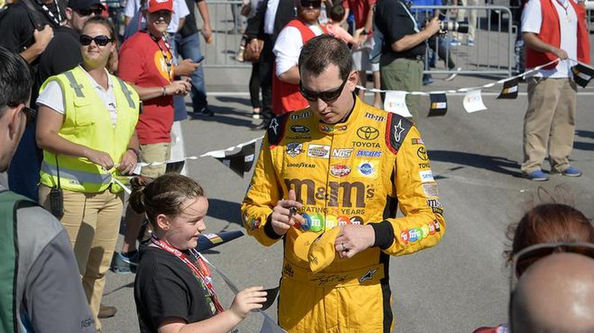 In October 2016, Cambryn Gratz of Canyon, Texas, was thrilled to have driver Kyle Busch autograph her hat before the start of a NASCAR Cup race at Kansas Speedway in Kansas City, Kansas.
